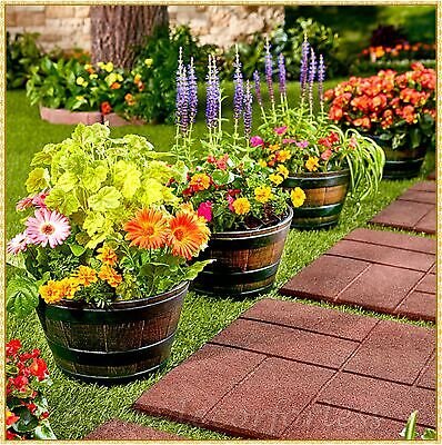 Barrels are great for flowers. This image shows flower barrels.